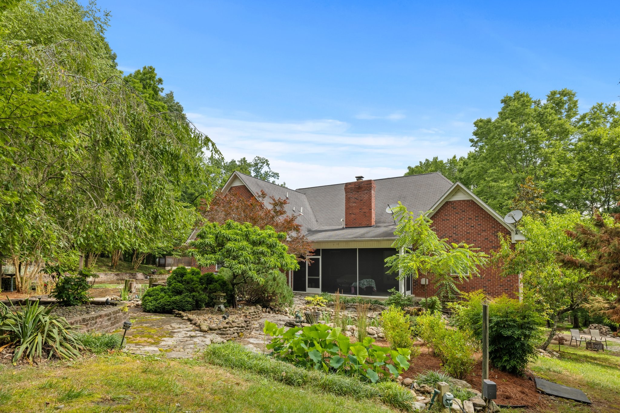 5375 Murfreesboro Road College Grove, TN 37046 - Photo 61 of 70 a front view of a house with a yard and garage