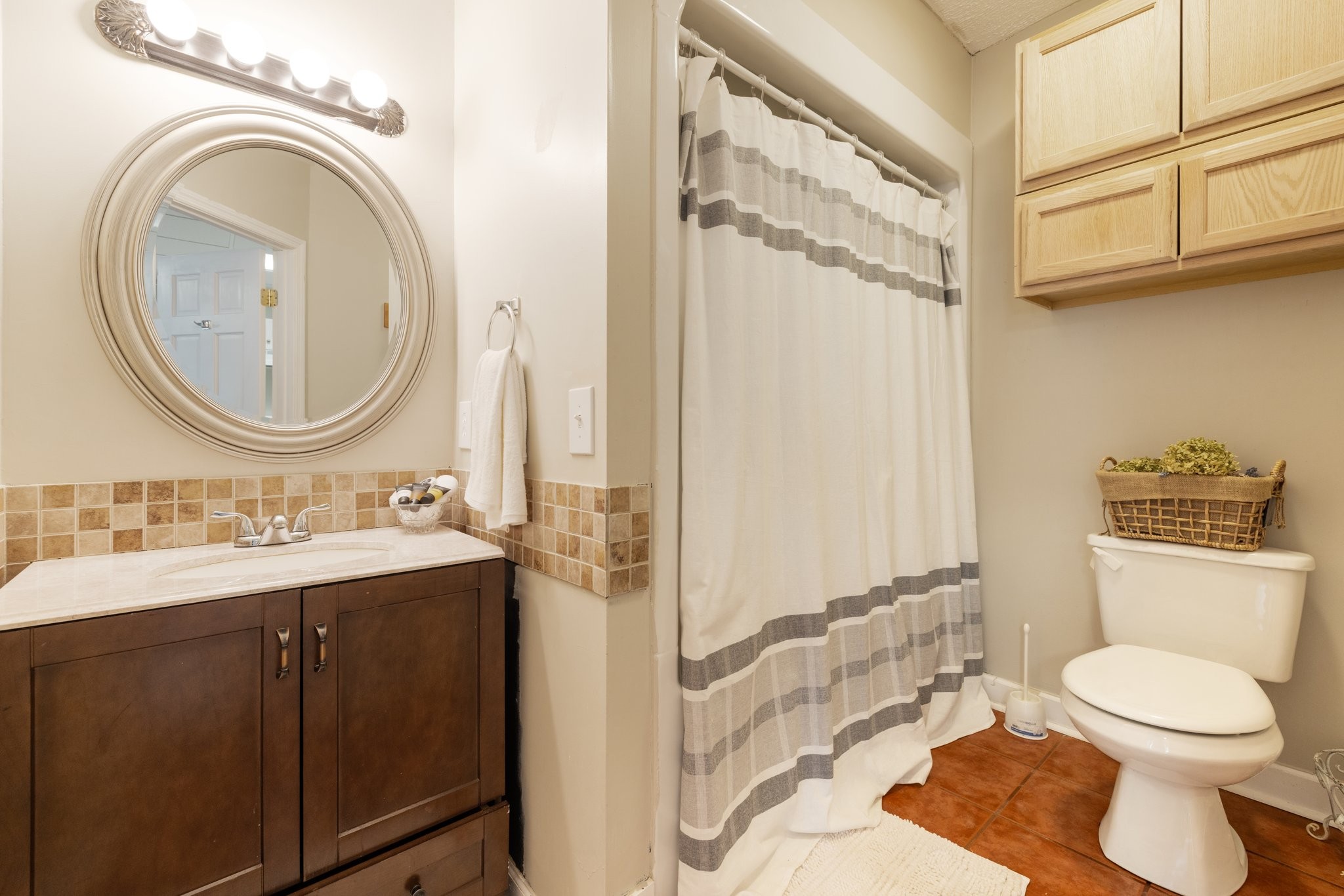 5375 Murfreesboro Road College Grove, TN 37046 - Photo 66 of 70 a bathroom with a toilet a sink and a mirror