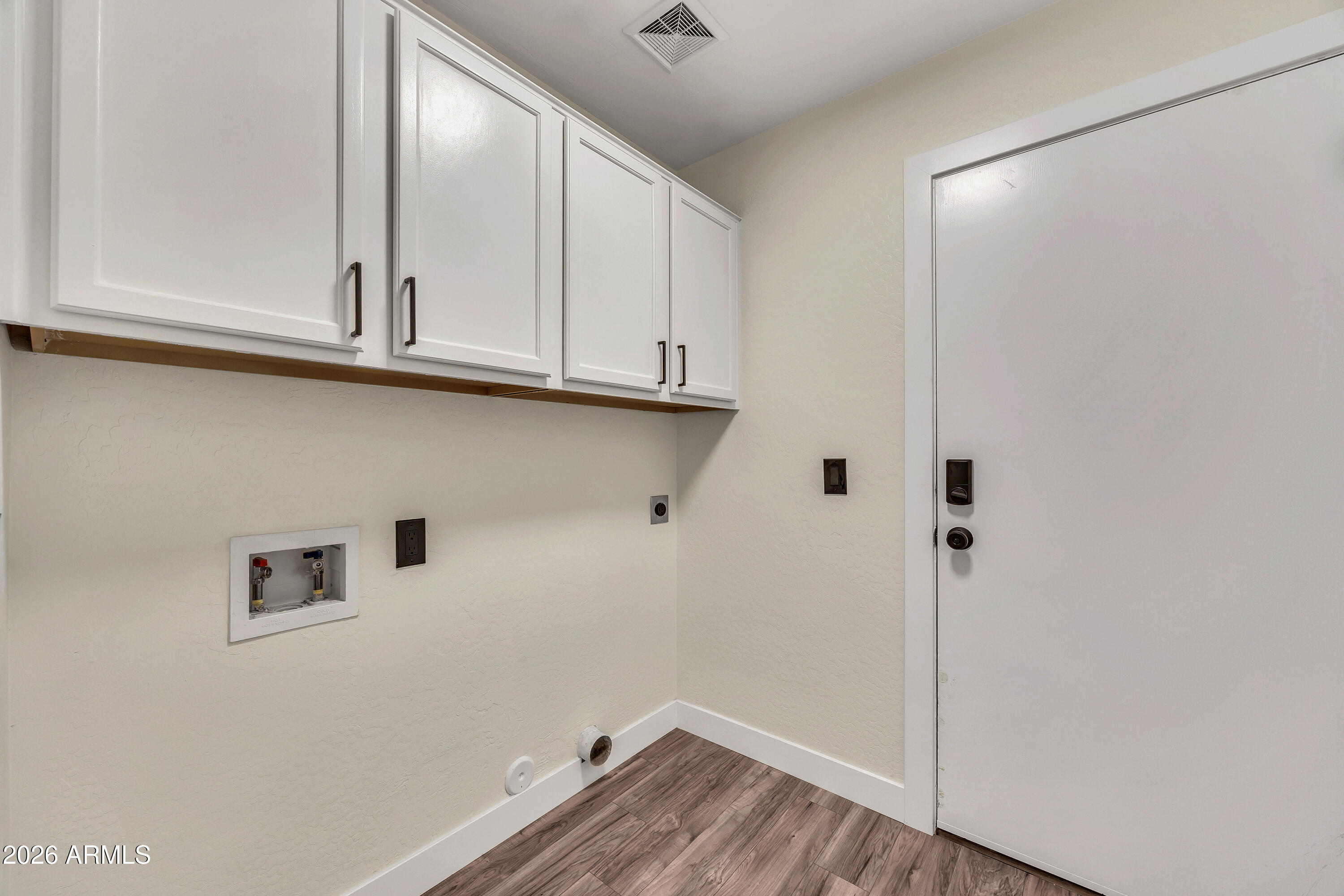 3283 East Bonanza Road Gilbert, AZ 85297 - Photo 14 of 31 a view of room with hardwood floor