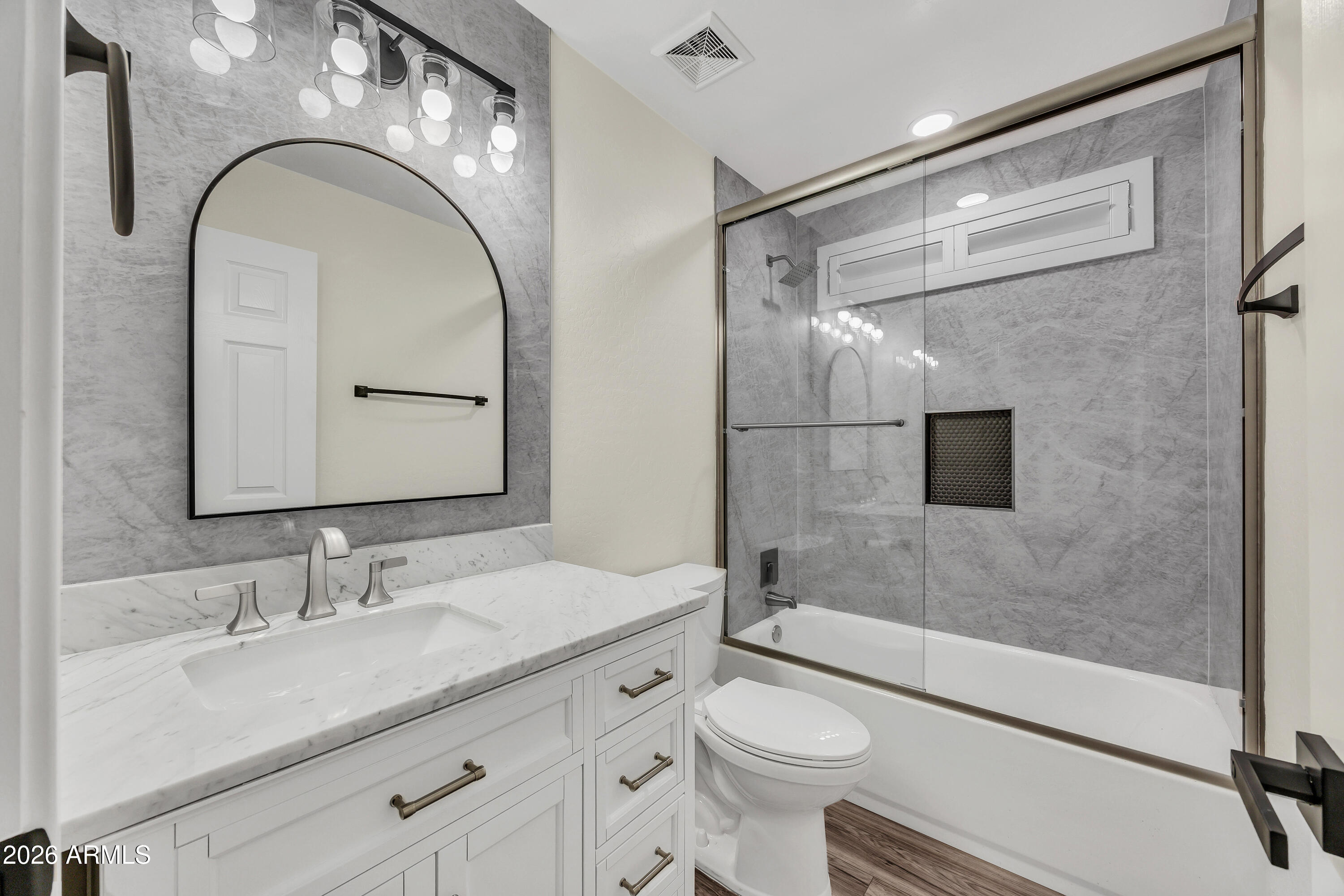 3283 East Bonanza Road Gilbert, AZ 85297 - Photo 20 of 31 a bathroom with a sink a toilet and shower