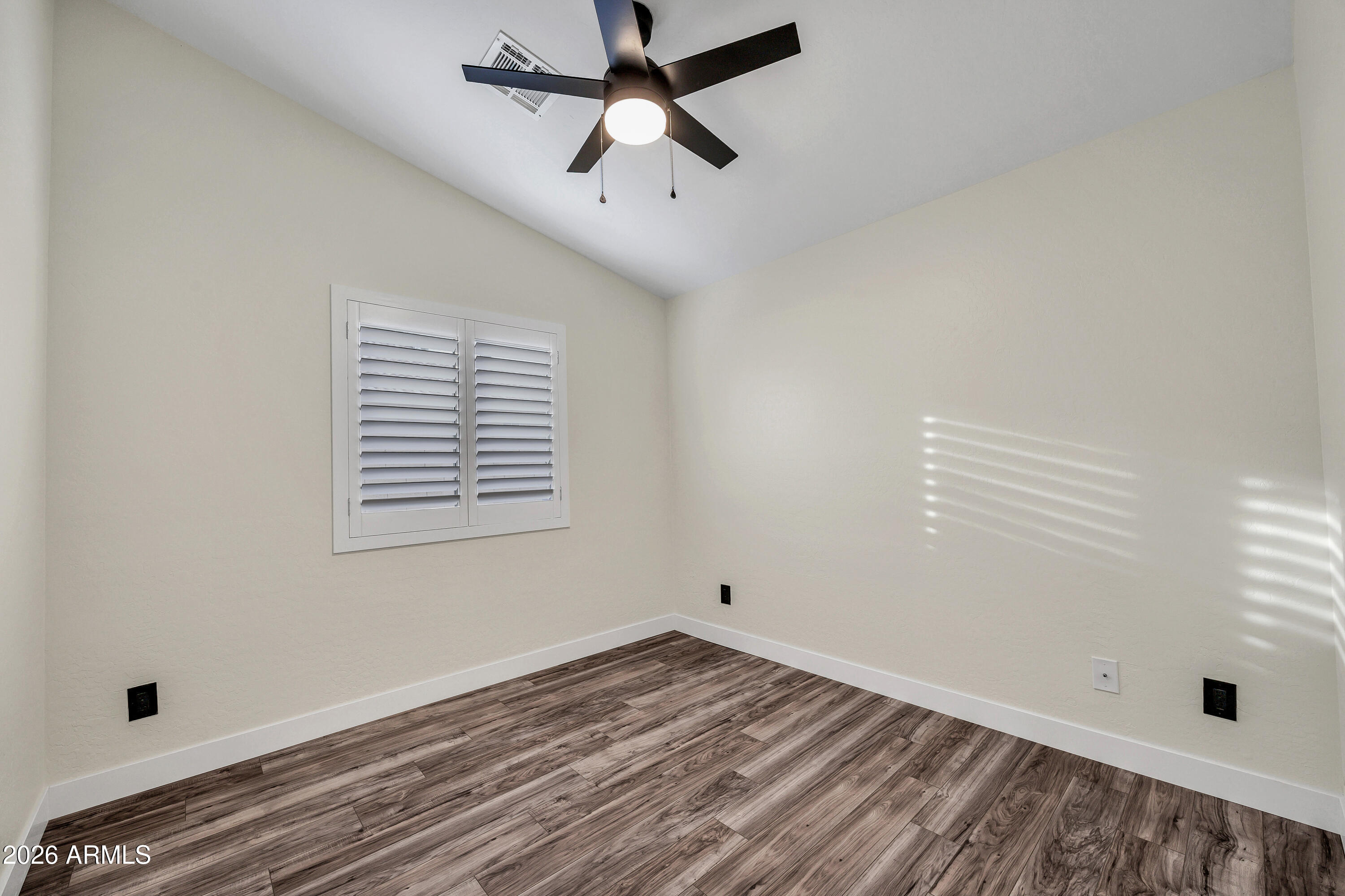 3283 East Bonanza Road Gilbert, AZ 85297 - Photo 21 of 31 a view of empty room with ceiling fan