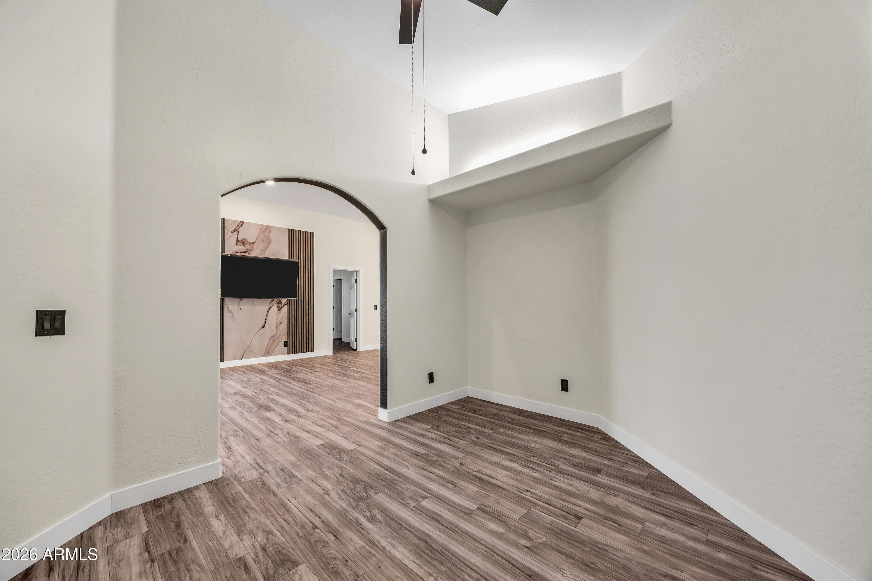 3283 East Bonanza Road Gilbert, AZ 85297 - Photo 22 of 31 a view of empty room with wooden floor