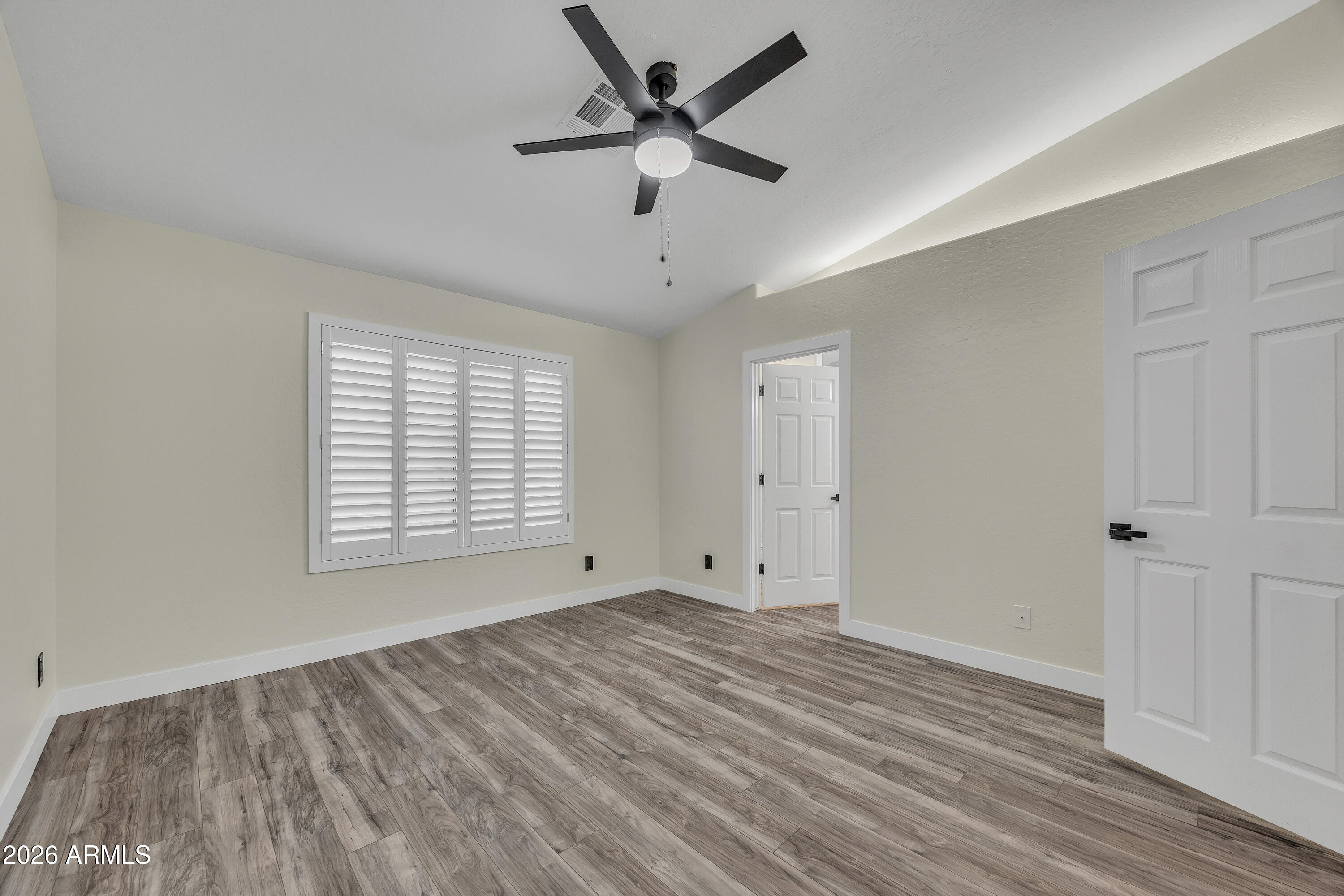 3283 East Bonanza Road Gilbert, AZ 85297 - Photo 29 of 31 a view of an empty room with a window
