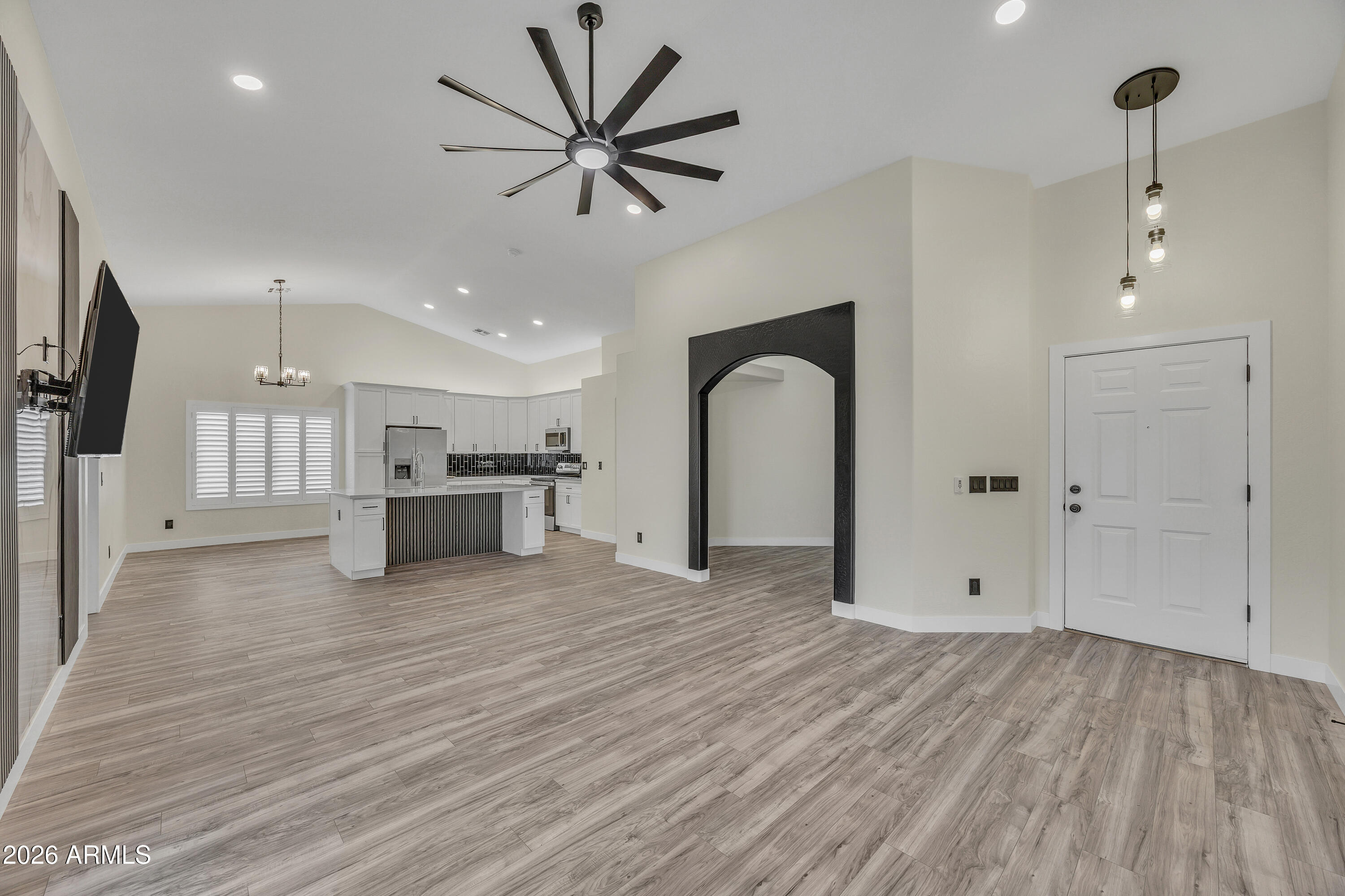 3283 East Bonanza Road Gilbert, AZ 85297 - Photo 8 of 31 a view of a kitchen with a sink and a large window