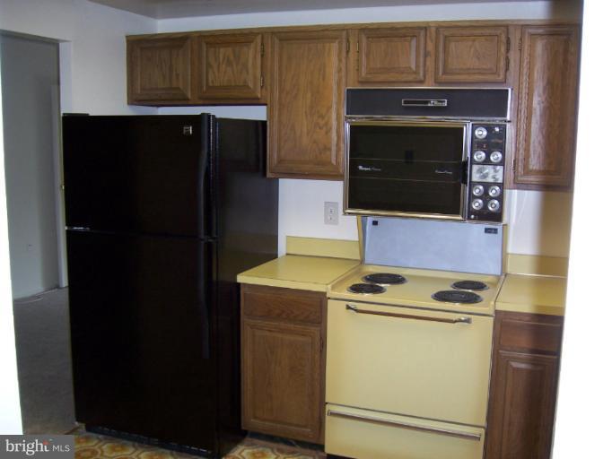 10004 Stedwick Road, Unit 104 Gaithersburg, MD 20886 - Photo 1 of 17 Kitchen