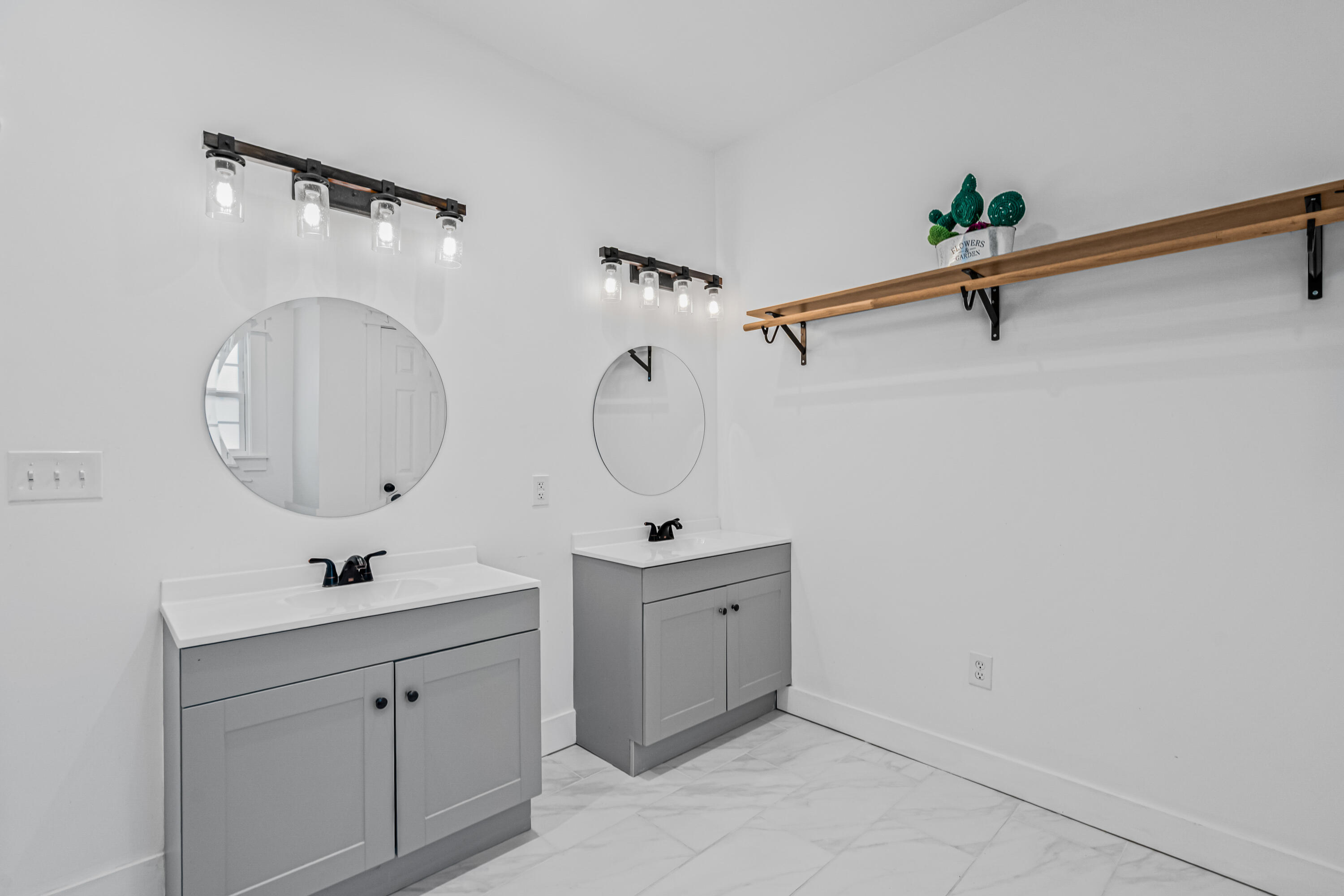 5681 Captain Kidd Road Hollywood, SC 29449 - Photo 42 of 49 Upstairs bath with double sinks