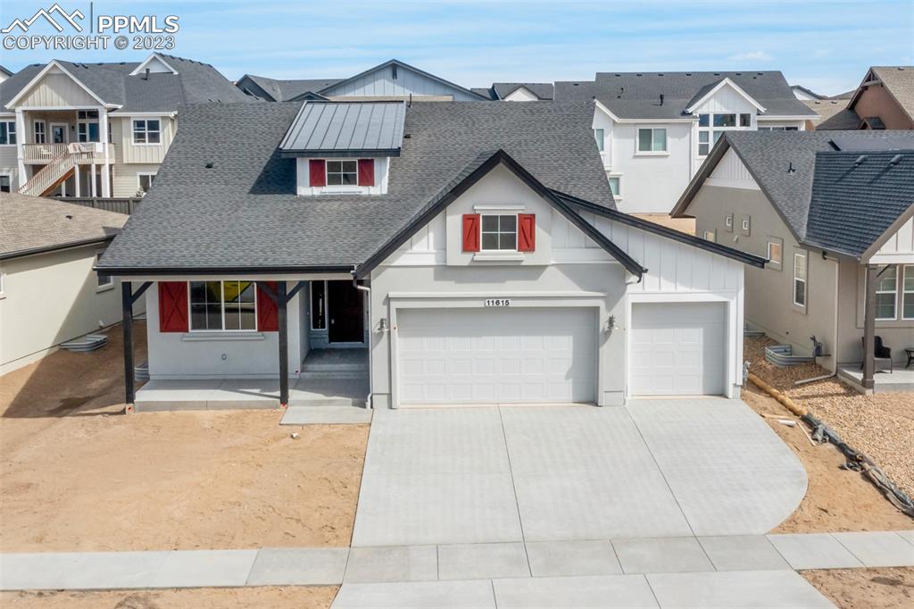 a view of house with yard