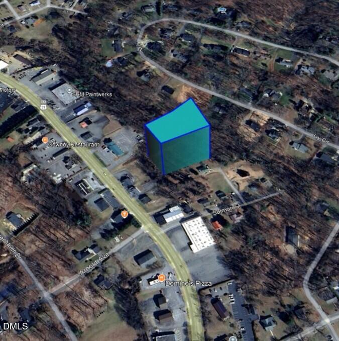 an aerial view of a houses with outdoor space