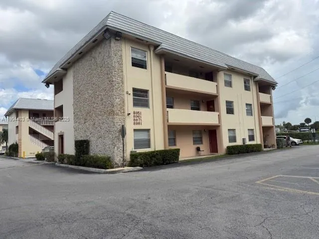 a view of a house with a street