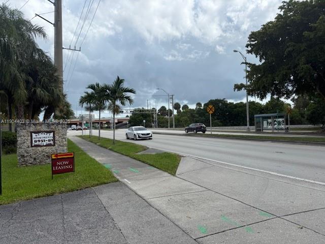 8951 Southwest 72nd Street, Unit 328 Miami, FL 33173 - Photo 2 of 7 a view of street with houses
