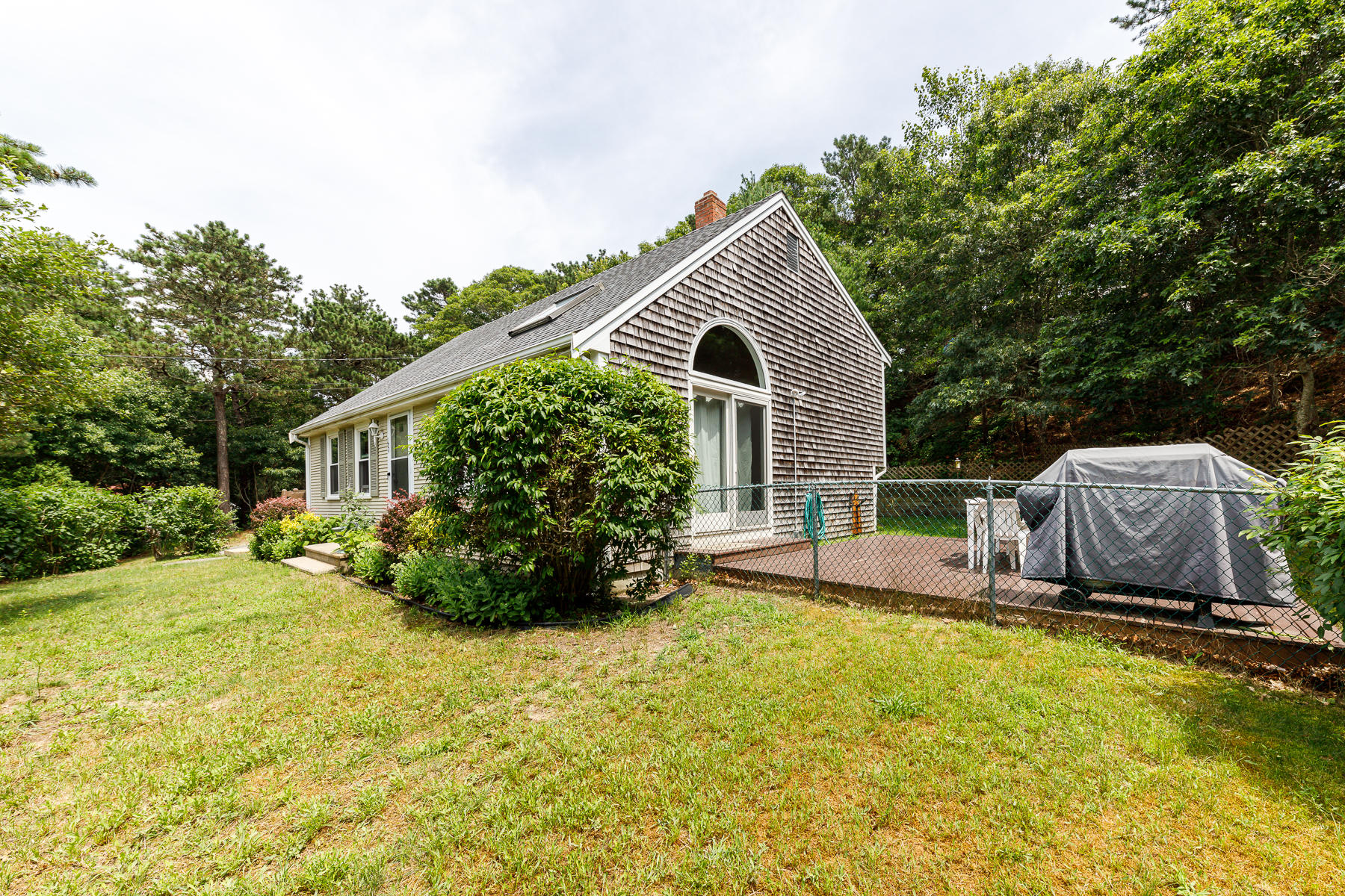 104 Valley Bars Road Bourne, MA 02532 - Photo 4 of 22 a house view with a outdoor space