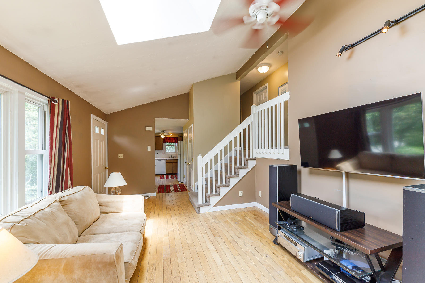 104 Valley Bars Road Bourne, MA 02532 - Photo 8 of 22 a living room with furniture and a flat screen tv