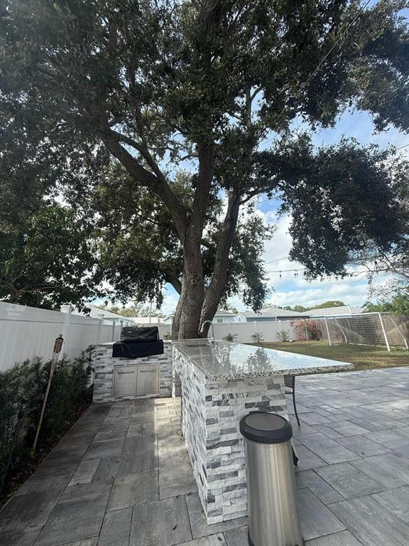 13272 Helm Street Largo, FL 33774 - Photo 15 of 20 a view of yard with large trees