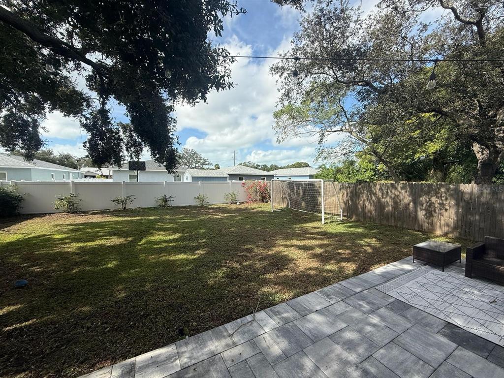 13272 Helm Street Largo, FL 33774 - Photo 17 of 20 a view of a yard with an outdoor space