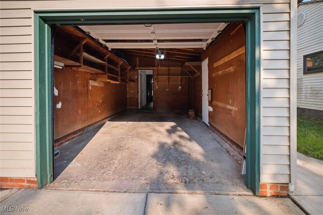 6683 Sherborn Road Cleveland, OH 44130 - Photo 38 of 42 Garage featuring a garage door opener