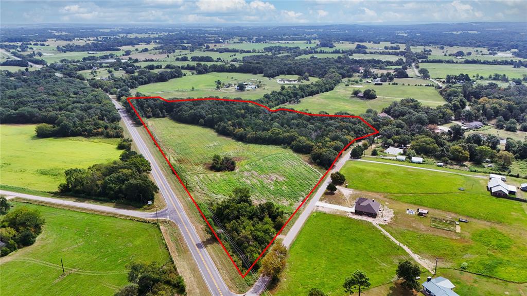0 St Highway Canton, TX 75103 - Photo 11 of 23 an aerial view of a residential houses with outdoor space and a lake view