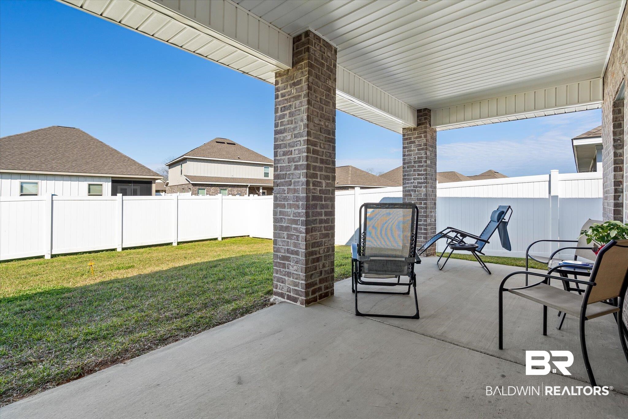 24262 Alydar Loop Daphne, AL 36526 - Photo 14 of 33 View of patio / terrace with a fenced backyard