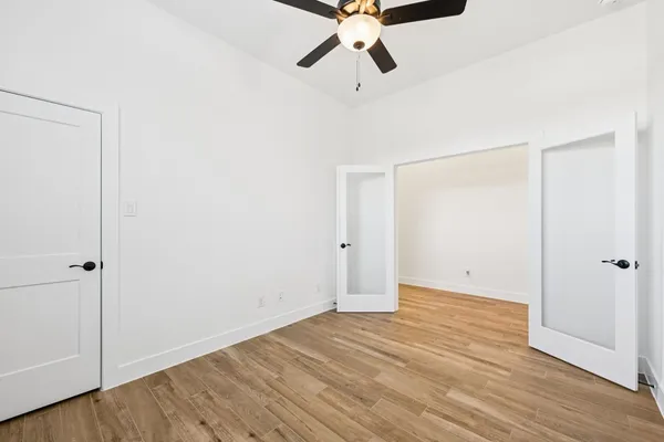a bathroom with a tub and shower