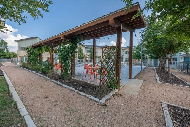a view of a backyard with garden