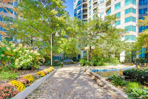 a view of a building with a garden