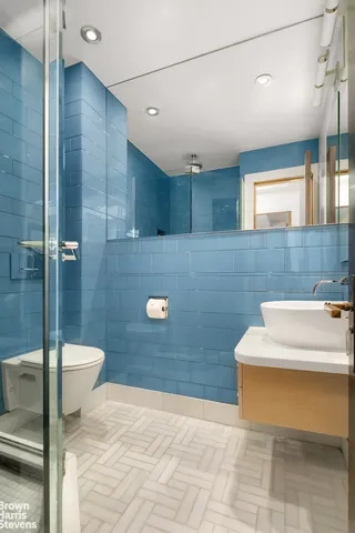 a bathroom with a sink and a toilet