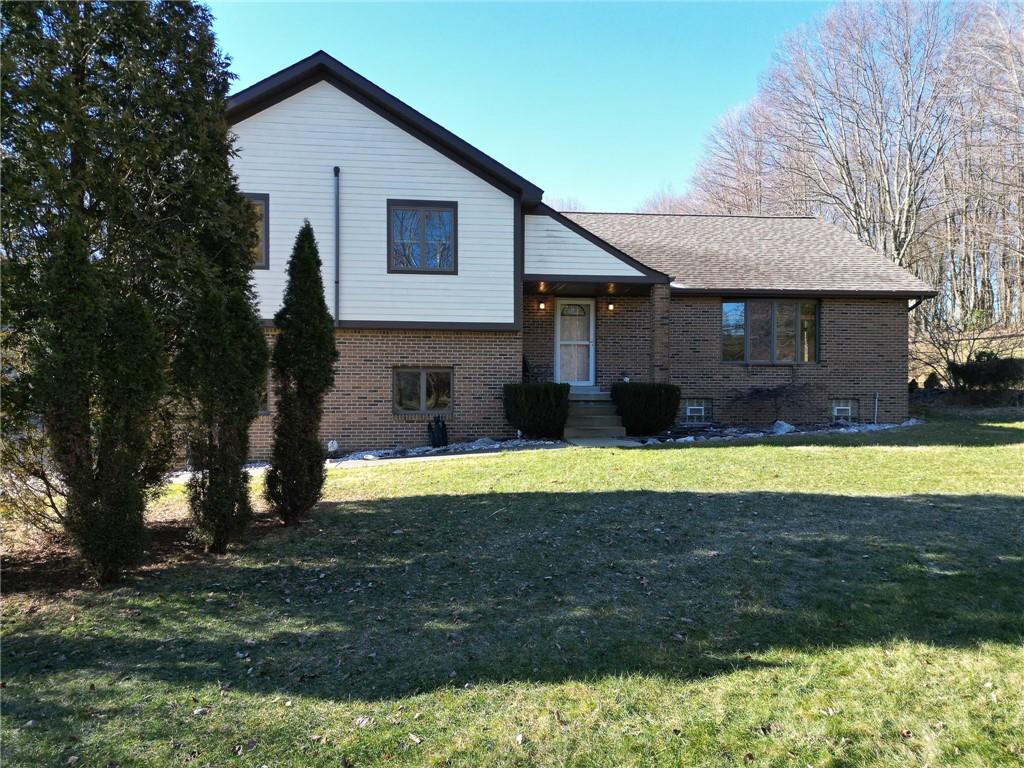 156 Critchlow School Road Renfrew, PA 16053 - Photo 2 of 49 a front view of house with yard and swimming pool