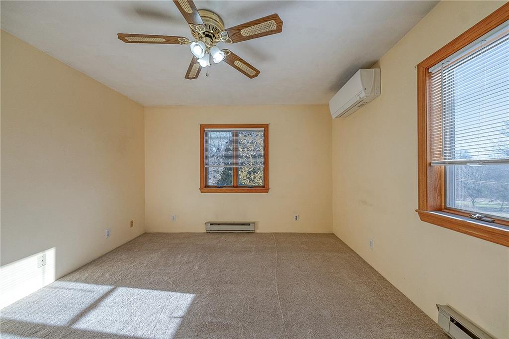 156 Critchlow School Road Renfrew, PA 16053 - Photo 42 of 49 an empty room with windows and fan