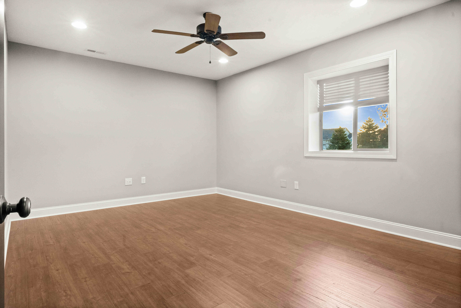 2526 Red Rock Road Normal, IL 61761 - Photo 21 of 38 an empty room with a window and a ceiling fan