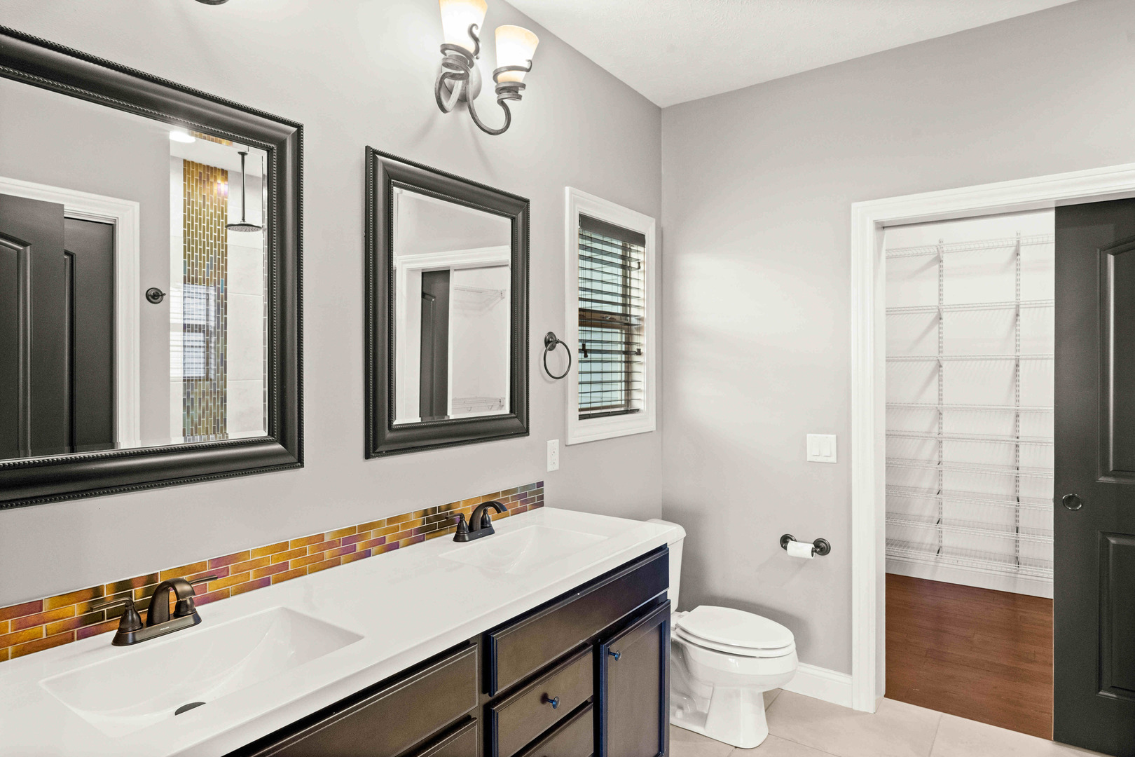 2526 Red Rock Road Normal, IL 61761 - Photo 22 of 38 a bathroom with a sink a toilet and shower