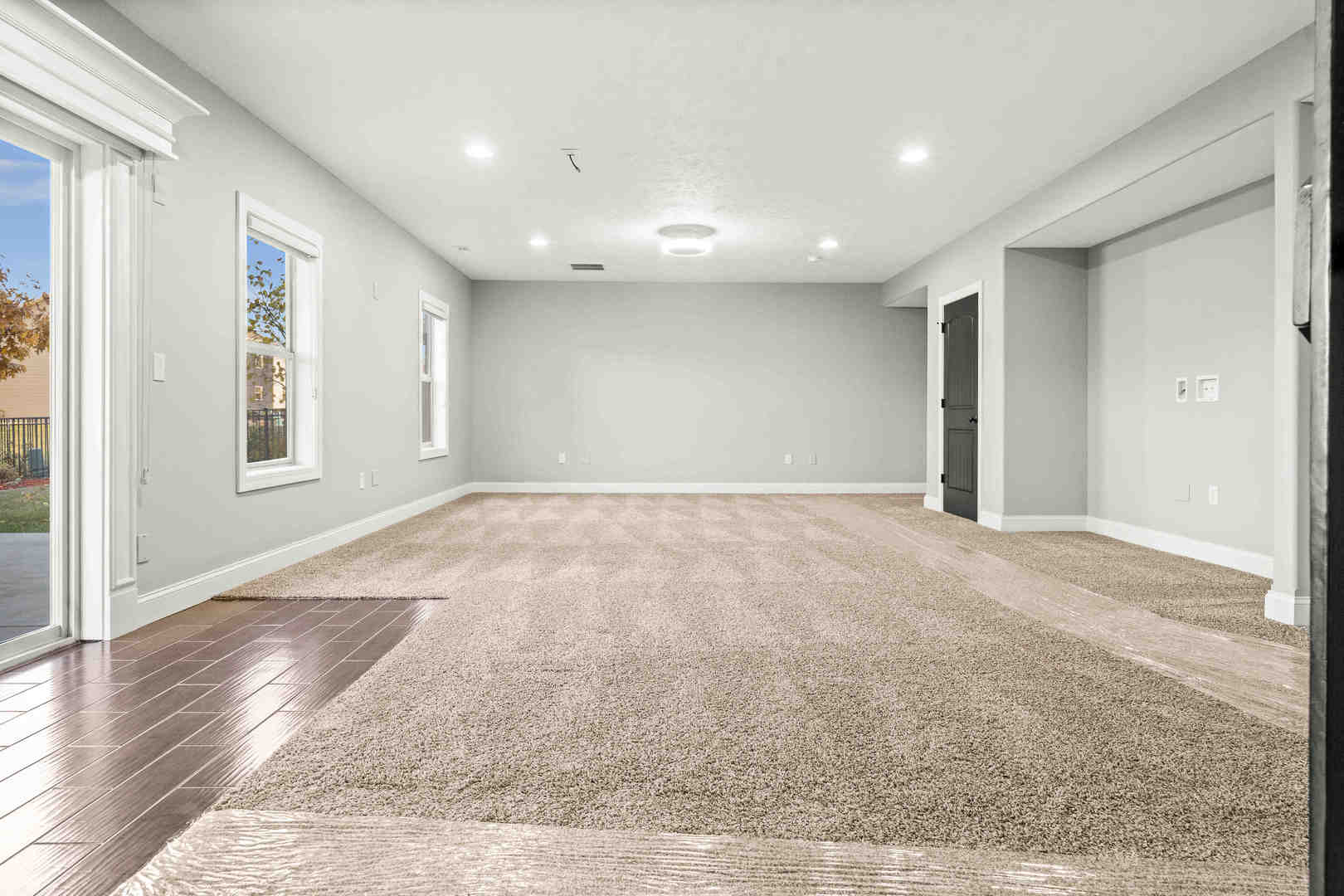 2526 Red Rock Road Normal, IL 61761 - Photo 28 of 38 an empty room with wooden floor and windows