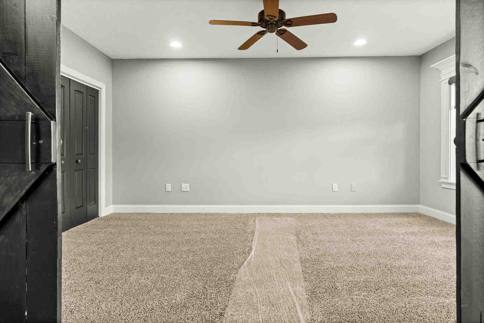 2526 Red Rock Road Normal, IL 61761 - Photo 30 of 38 an empty room with wooden floor and windows