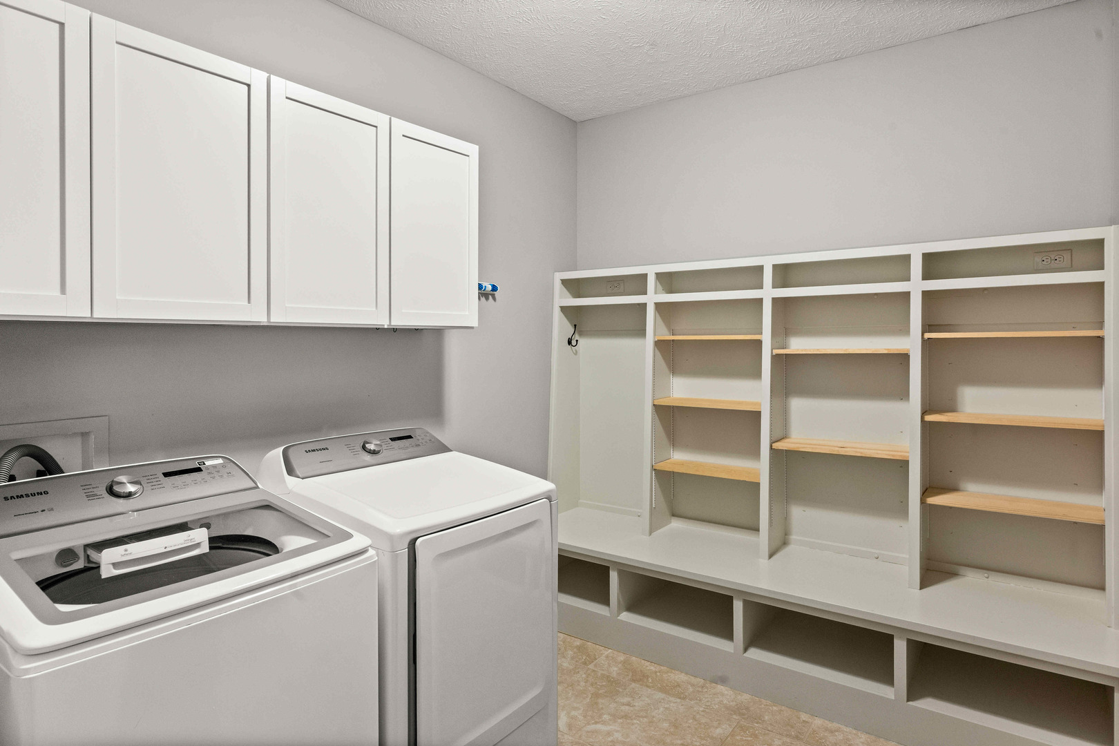 2526 Red Rock Road Normal, IL 61761 - Photo 5 of 38 a view of storage and utility room with washer and dryer