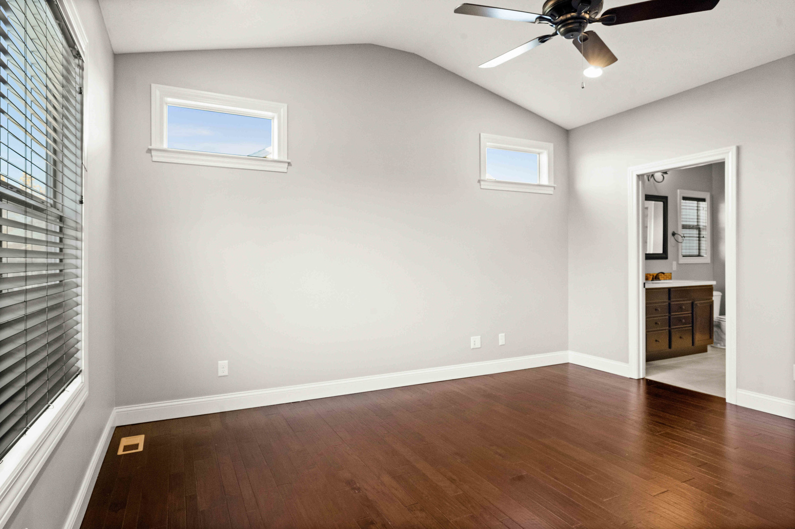 2526 Red Rock Road Normal, IL 61761 - Photo 8 of 38 a view of an empty room with a window and wooden floor