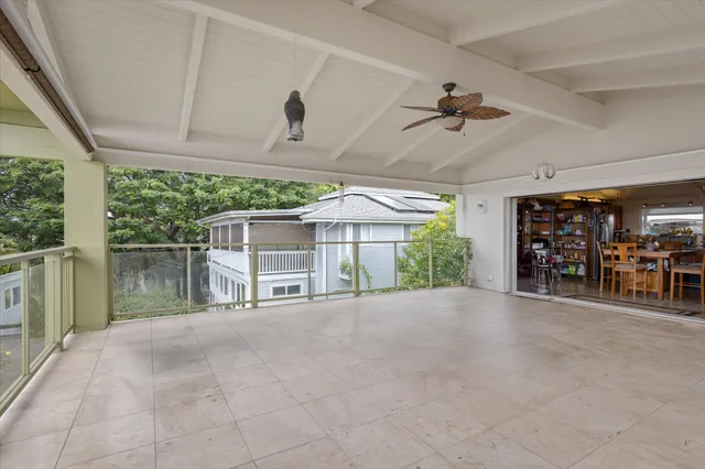 a living room with lots of furniture and lots of furniture