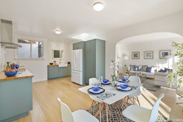 a bedroom with a bed and lamps