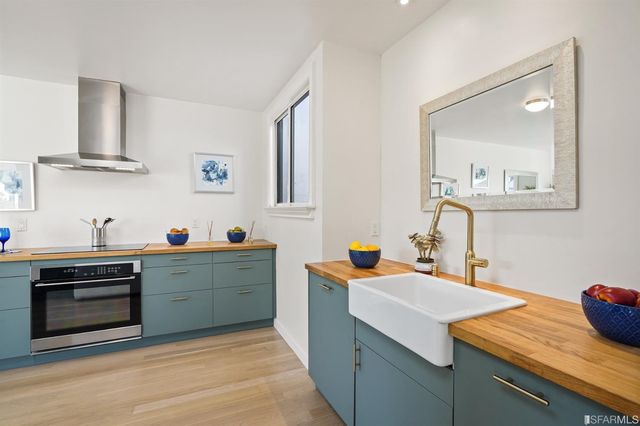 a bathroom with a sink a toilet and a bathtub