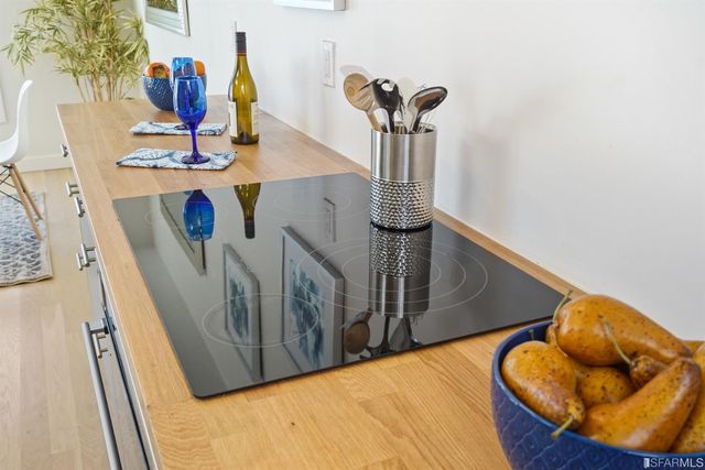 a view of room with lounge chair and wooden floor