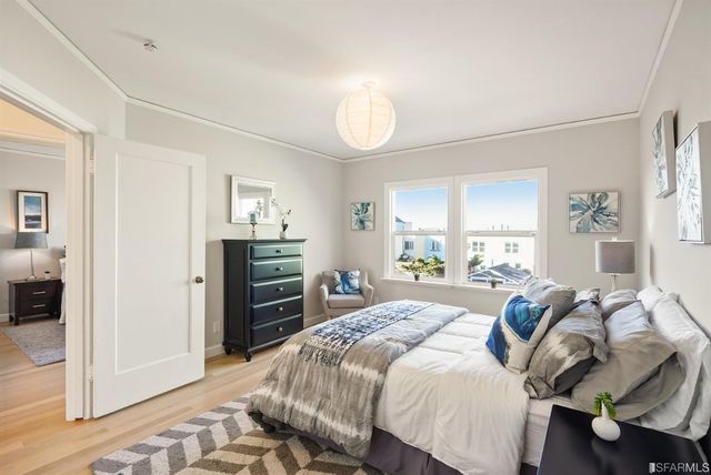 a view of house with outdoor space and seating area