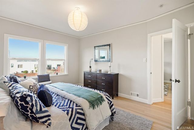 a view of a patio with a table and chair