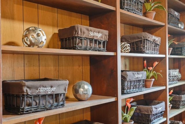 a view of a store room with table and chairs