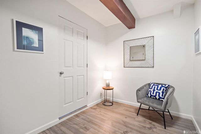 a view of a street with sitting area