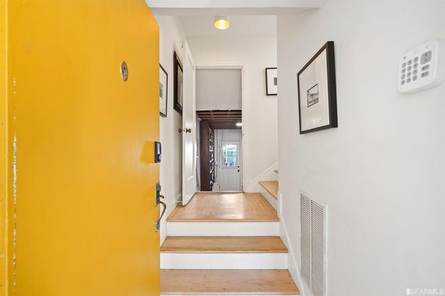 a view of a living room with a bathroom