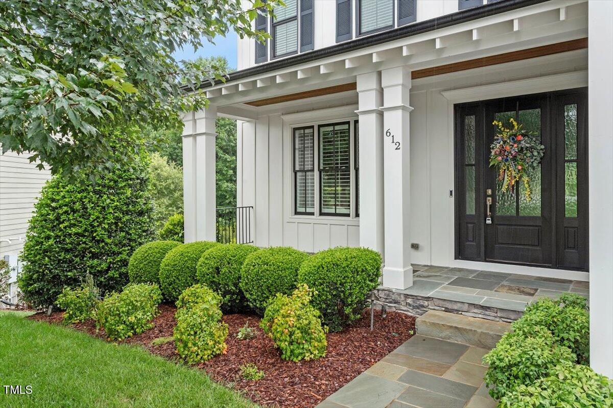 612 Hawks Ridge Court Apex, NC 27539 - Photo 2 of 58 a view of a entrance door of the house