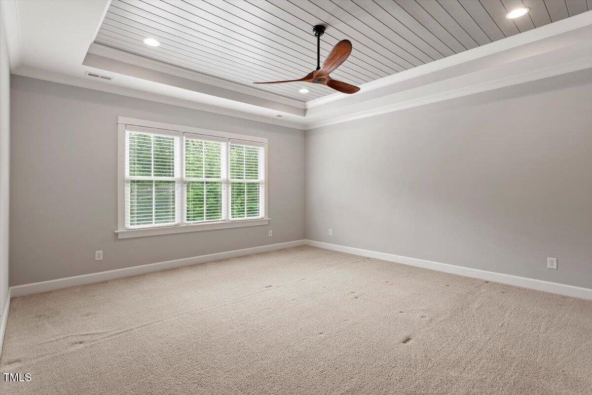 612 Hawks Ridge Court Apex, NC 27539 - Photo 25 of 58 an empty room with windows
