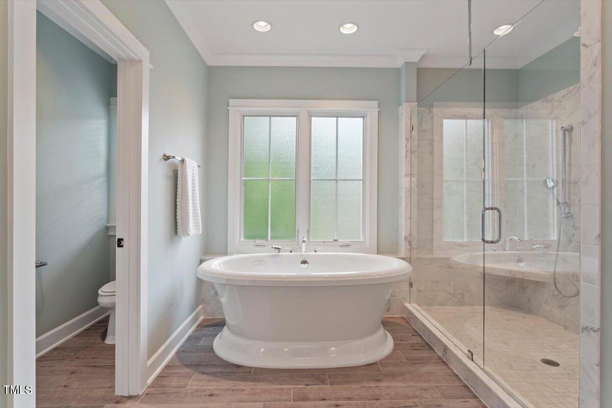 612 Hawks Ridge Court Apex, NC 27539 - Photo 30 of 58 a bathroom with a sink and a mirror