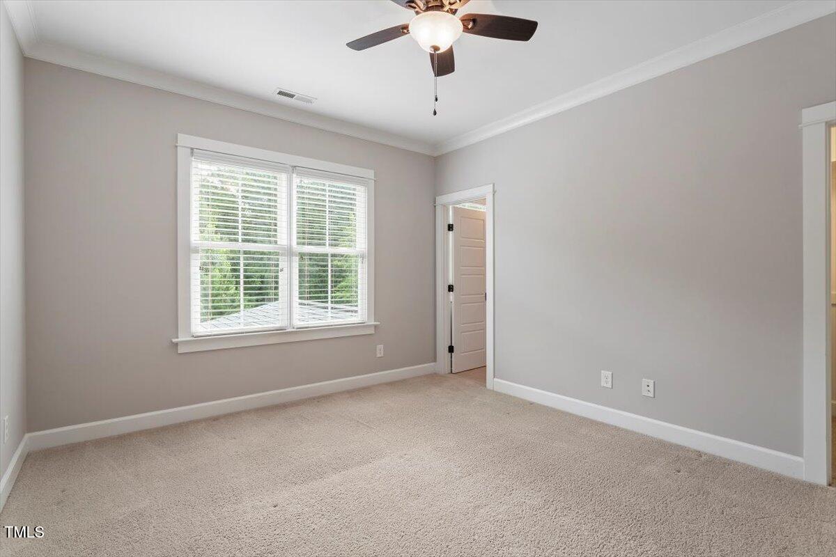 612 Hawks Ridge Court Apex, NC 27539 - Photo 39 of 58 a view of an empty room with a window