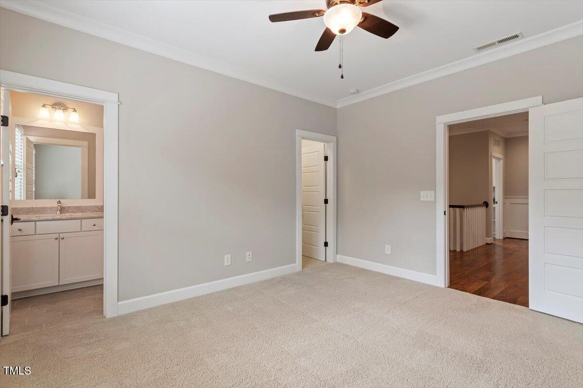 612 Hawks Ridge Court Apex, NC 27539 - Photo 40 of 58 a view of an empty room and a bathroom