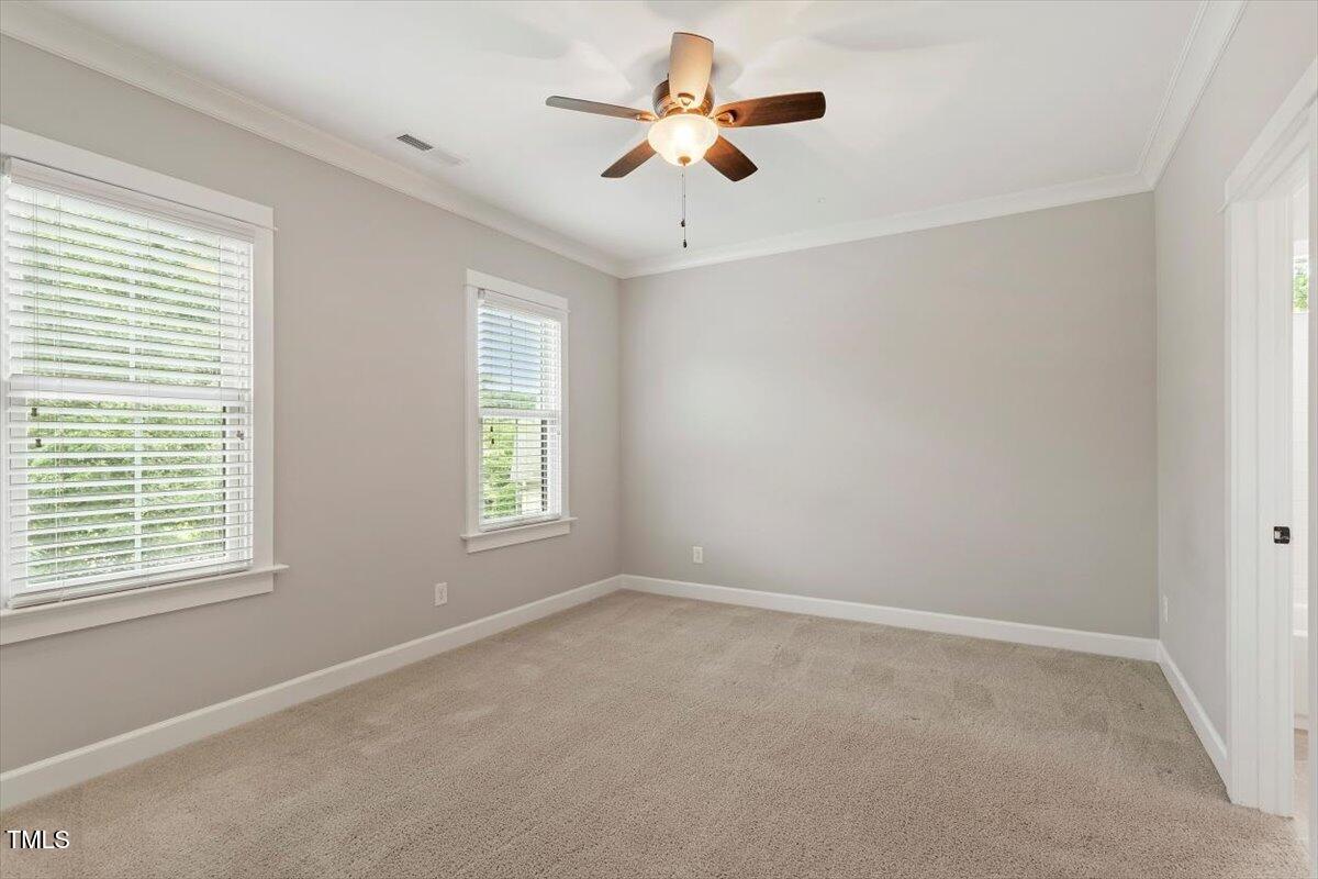 612 Hawks Ridge Court Apex, NC 27539 - Photo 47 of 58 a view of an empty room with a window