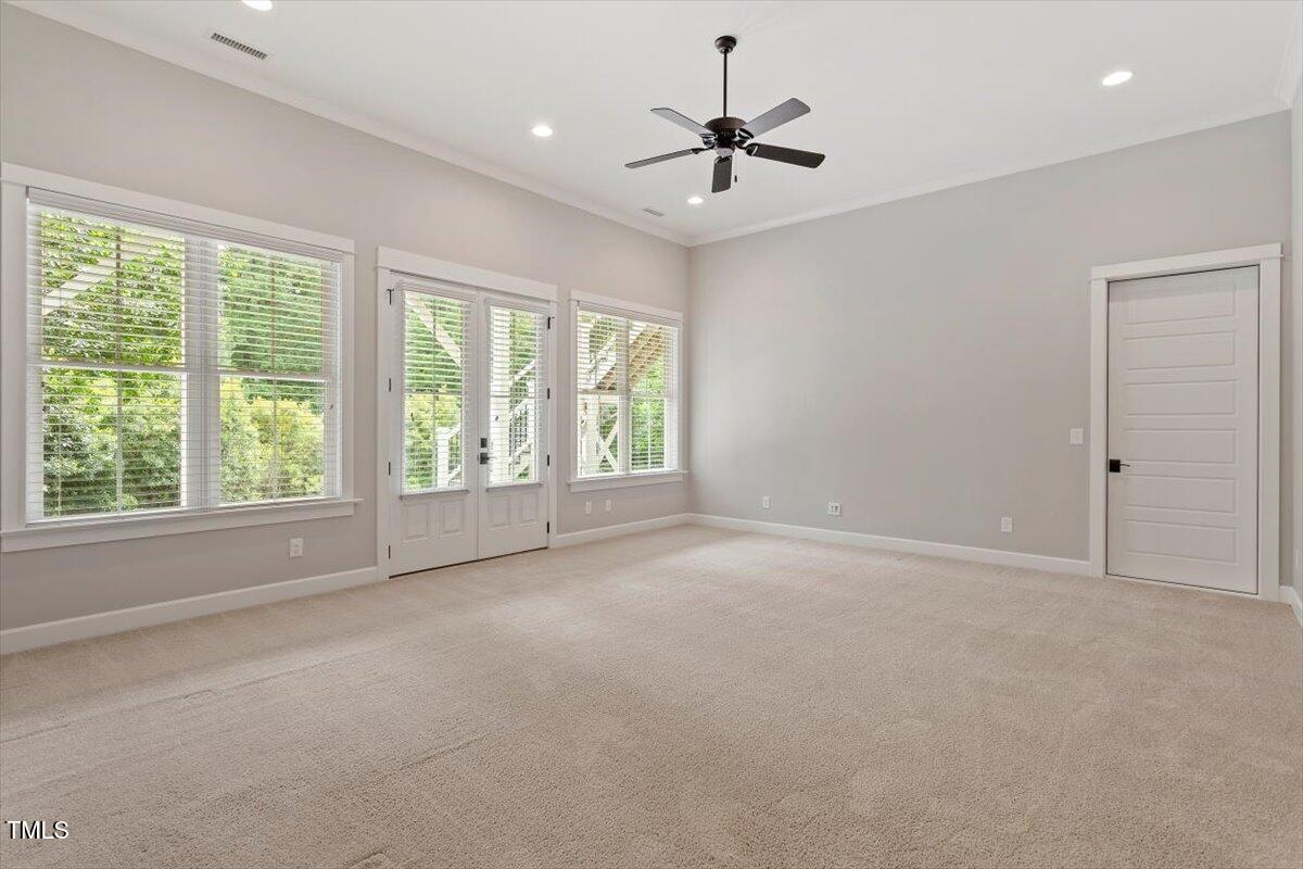 612 Hawks Ridge Court Apex, NC 27539 - Photo 50 of 58 a view of an empty room with a window