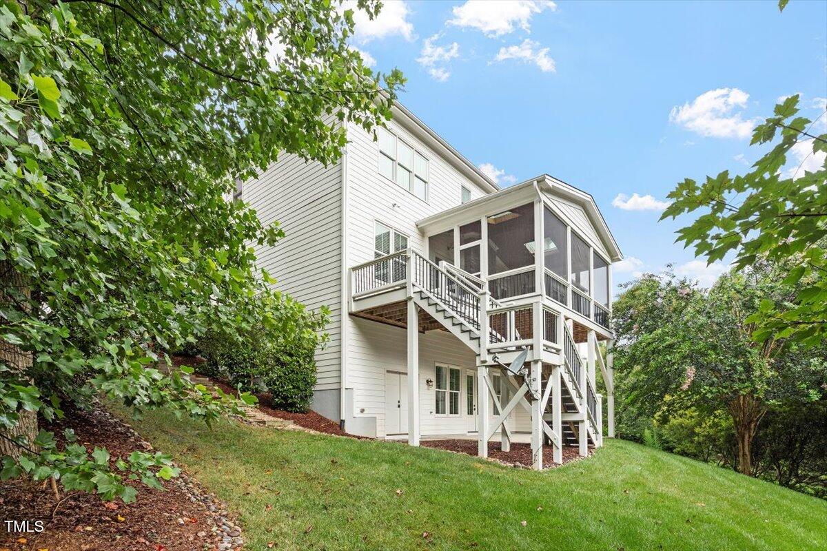 612 Hawks Ridge Court Apex, NC 27539 - Photo 56 of 58 a view of a house with a yard
